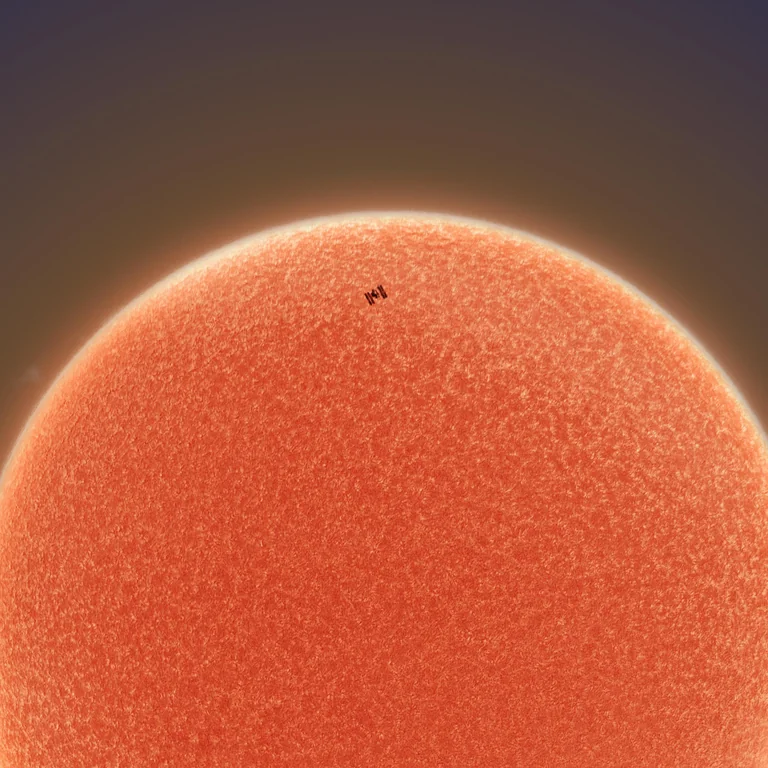 iss crossing the sun